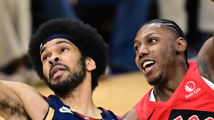 Cleveland Cavaliers center Jarrett Allen goes to the basket against Toronto Raptors forward RJ Barrett.