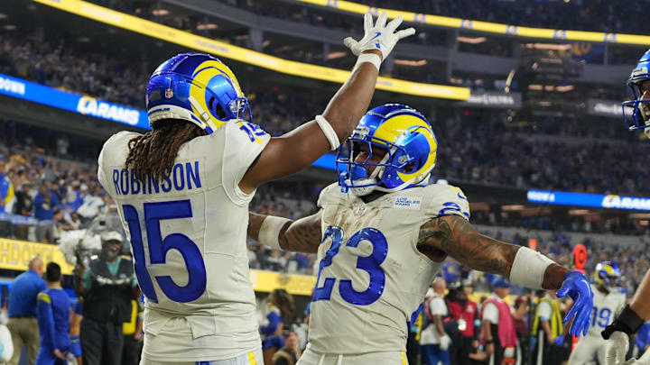 Oct 24, 2024; Inglewood, California, USA; Los Angeles Rams wide receiver Demarcus Robinson (15), running back Kyren Williams (23) and tight end Colby Parkinson (86) celebrate after a touchdown against the Minnesota Vikings in the second half at SoFi Stadium. Mandatory Credit: Kirby Lee-Imagn Images