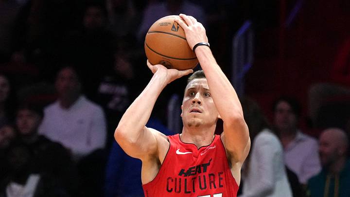 Jan 4, 2025; Miami, Florida, USA; Miami Heat forward Duncan Robinson (55) shoots over Utah Jazz guard Collin Sexton (2) during the second half at Kaseya Center. Mandatory Credit: Jim Rassol-Imagn Images Jan 4, 2025; Miami, Florida, USA; Miami Heat forward Duncan Robinson (55) shoots over Utah Jazz guard Collin Sexton (2) during the second half at Kaseya Center. Mandatory Credit: Jim Rassol-Imagn Images