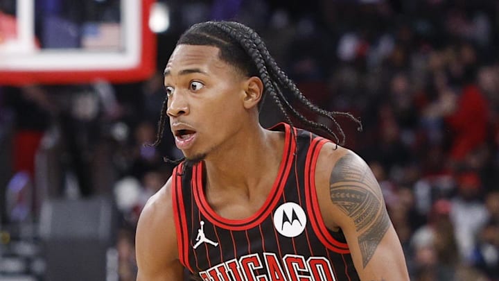 Feb 26, 2026; Chicago, Illinois, USA; Chicago Bulls guard Rob
Dillingham (7) brings the ball up court against Portland Trail Blazers guard Jrue Holiday (5) during the first half of an NBA game at United Center. Mandatory Credit: Kamil Krzaczynski-Imagn Images