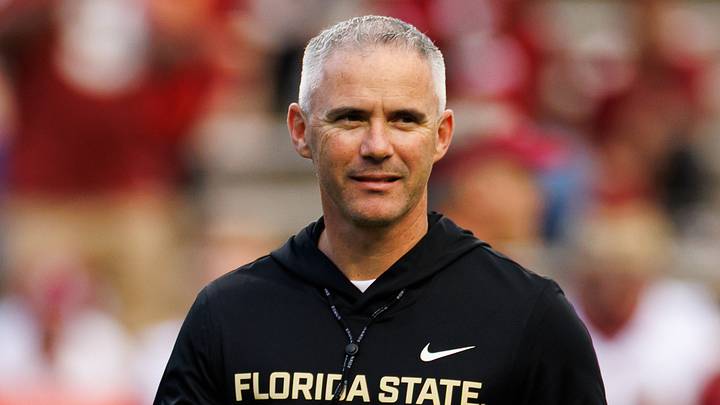 Nov 29, 2025; Gainesville, Florida, USA; Florida State Seminoles head coach Mike Norvell walks on the field before a game against the Florida Gators at Ben Hill Griffin Stadium. Mandatory Credit: Matt Pendleton-Imagn Images