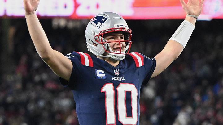 Jan 4, 2026; Foxborough, Massachusetts, USA; New England Patriots quarterback Drake Maye (10) reacts to a Patriots touchdown scored against the Miami Dolphins during the first quarter at Gillette Stadium. Mandatory Credit: Brian Fluharty-Imagn Images Jan 4, 2026; Foxborough, Massachusetts, USA; New England Patriots quarterback Drake Maye (10) reacts to a Patriots touchdown scored against the Miami Dolphins during the first quarter at Gillette Stadium. Mandatory Credit: Brian Fluharty-Imagn Images
