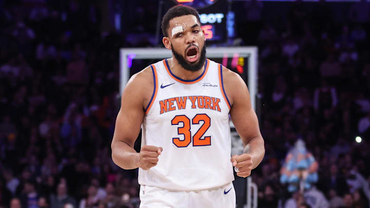 Feb 4, 2026; New York, New York, USA;  New York Knicks center Karl-Anthony Towns (32) celebrates in the fourth quarter against the Denver Nuggets at Madison Square Garden. Mandatory Credit: Wendell Cruz-Imagn Images