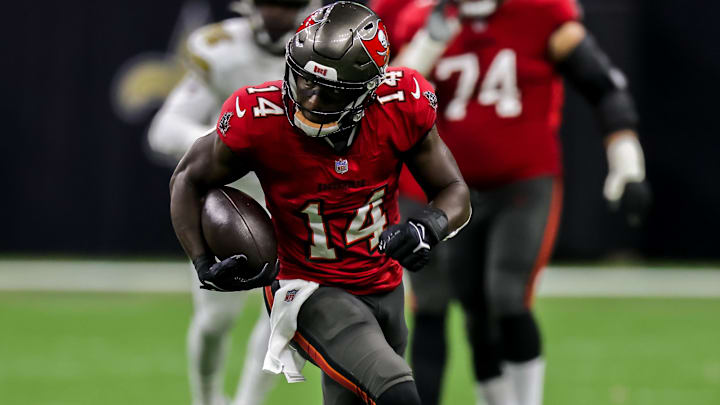 Oct 31, 2021; New Orleans, Louisiana, USA;  Tampa Bay Buccaneers wide receiver Chris Godwin (14) runs against New Orleans Saints during the second half at Caesars Superdome. Mandatory Credit: Stephen Lew-Imagn Images