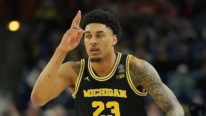 Apr 4, 2026; Indianapolis, IN, USA; Michigan Wolverines forward Yaxel Lendeborg (23) reacts against the Arizona Wildcats in the second half during a semifinal of the Final Four of the men's 2026 NCAA Tournament at Lucas Oil Stadium. Mandatory Credit: Robert Deutsch-Imagn Images Apr 4, 2026; Indianapolis, IN, USA; Michigan Wolverines forward Yaxel Lendeborg (23) reacts against the Arizona Wildcats in the second half during a semifinal of the Final Four of the men's 2026 NCAA Tournament at Lucas Oil Stadium. Mandatory Credit: Robert Deutsch-Imagn Images