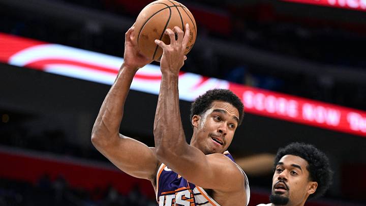 Oct 5, 2026; Detroit, Michigan, USA; Phoenix Suns forward Oso Ighodaro (11) pulls down a rebound in front of Detroit Pistons forward Tolu Smith (35) in the second quarter at Little Caesars Arena. Mandatory Credit: Lon Horwedel-Imagn Images Oct 5, 2026; Detroit, Michigan, USA; Phoenix Suns forward Oso Ighodaro (11) pulls down a rebound in front of Detroit Pistons forward Tolu Smith (35) in the second quarter at Little Caesars Arena. Mandatory Credit: Lon Horwedel-Imagn Images