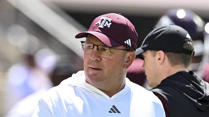 Texas A&M Aggies head coach Mike Elko walks on the field prior to the game against the Auburn Tigers at Kyle Field. Texas A&M Aggies head coach Mike Elko walks on the field prior to the game against the Auburn Tigers at Kyle Field.
