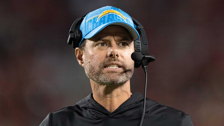 Former Los Angeles Chargers coach Brandon Staley works on the sideline.