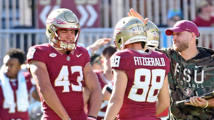 Nov 2, 2024; Tallahassee, Florida, USA;  Florida State Seminoles kicker Ryan Fitzgerald (88) celebrates with teammates after kicking a 56-yard field goal against the North Carolina Tarheels at Doak S. Campbell Stadium during the first half. Mandatory Credit: Robert Myers-Imagn Images