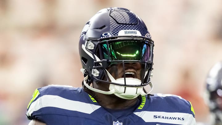 Sep 25, 2025; Glendale, Arizona, USA; Seattle Seahawks tackle Jarran Reed (90) against the Arizona Cardinals at State Farm Stadium. Mandatory Credit: Mark J. Rebilas-Imagn Images