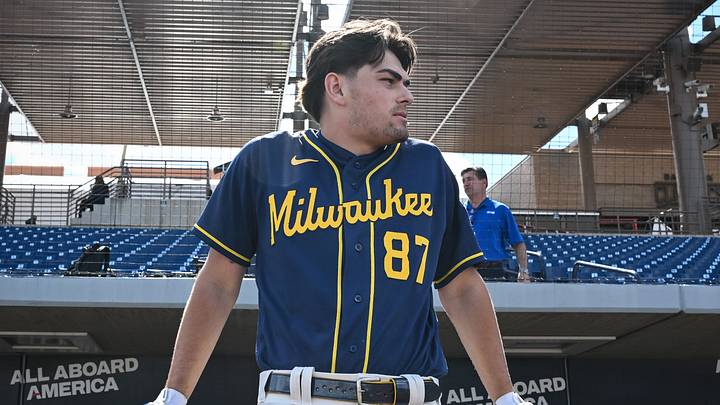 Milwaukee Brewers infield prospect Brady Ebel leans along the dugout rail during spring training workouts Tuesday, February 17, 2026, at American Family Fields of Phoenix in Phoenix, Arizona. Milwaukee Brewers infield prospect Brady Ebel leans along the dugout rail during spring training workouts Tuesday, February 17, 2026, at American Family Fields of Phoenix in Phoenix, Arizona.