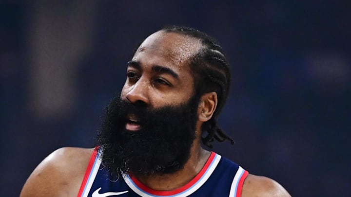 Los Angeles Clippers guard James Harden argues a call with referee Curtis Blair.