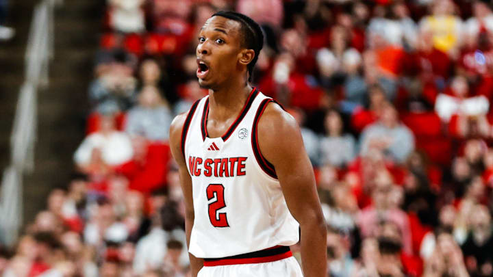 Feb 1, 2025; Raleigh, North Carolina, USA; North Carolina State Wolfpack guard Paul McNeil (2) reacts to his point ball during the first half of the game against the Clemson Tigers at Lenovo Center. Mandatory Credit: Jaylynn Nash-Imagn Images