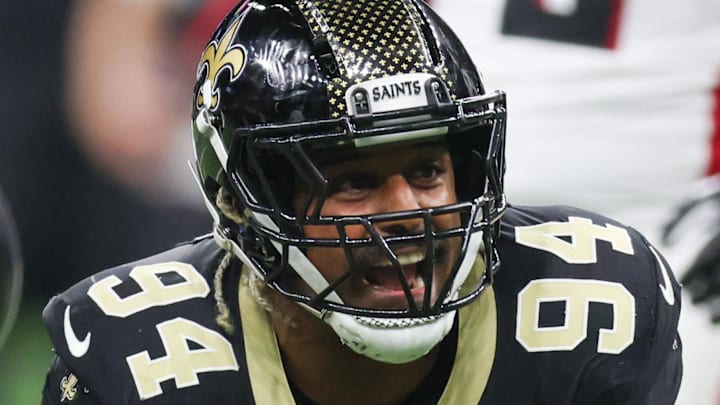 Nov 23, 2025; New Orleans, Louisiana, USA; New Orleans Saints defensive end Cameron Jordan (94) reacts after forcing a fumble against the Atlanta Falcons during the first half at Caesars Superdome. Mandatory Credit: Stephen Lew-Imagn Images
