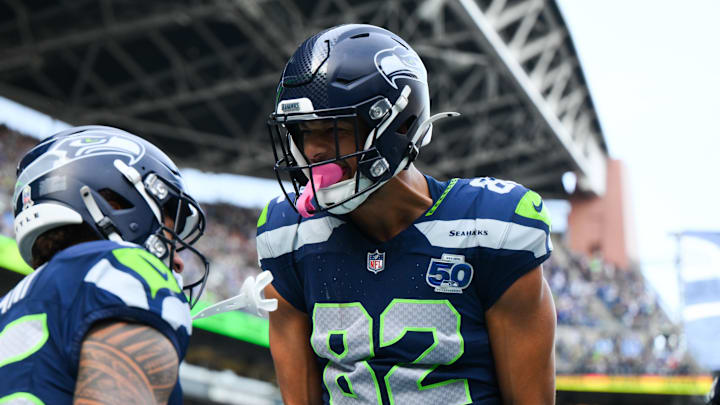 Nov 9, 2025; Seattle, Washington, USA; Seattle Seahawks running back George Holani (36) celebrates with Seattle Seahawks wide receiver Cody White (82) after scoring a touchdown during the first quarter against the Arizona Cardinals at Lumen Field. Mandatory Credit: Steven Bisig-Imagn Images