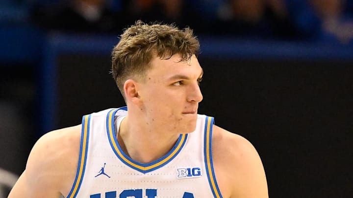 Feb 21, 2026; Los Angeles, California, USA; UCLA forward Tyler Bilodeau (34) runs back on defense after scoring a three-point basket during the second half against the Illinois Fighting Illini at Pauley Pavilion presented by Wescom Financial. Mandatory Credit: Robert Hanashiro-Imagn Images