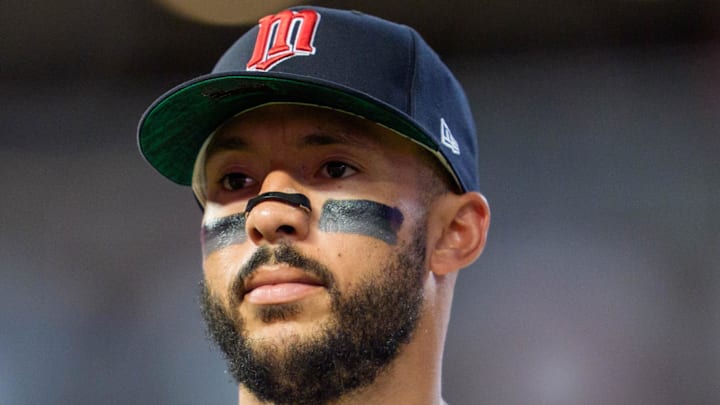 Minnesota Twins shortstop Carlos Correa (4) walks to the dugout after the ninth inning against the Washington Nationals at Target Field on July 26. 