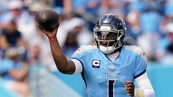 Tennessee Titans quarterback Cam Ward (1) throws a pass to wide receiver Elic Ayomanor (5)