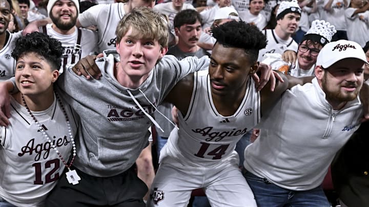Texas A&M Aggies guard Jacari Lane, forward Chris McDermott and forward Zach Clemence celebrate with the students after the win over Mississippi State Bulldogs. Texas A&M Aggies guard Jacari Lane, forward Chris McDermott and forward Zach Clemence celebrate with the students after the win over Mississippi State Bulldogs.