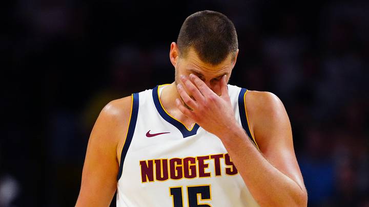 Oct 4, 2026; Boulder, Colorado, USA;  Denver Nuggets center Nikola Jokic (15) reacts in the second quarter against the Utah Jazz at CU Events Center.  Mandatory Credit: Ron Chenoy-Imagn Images