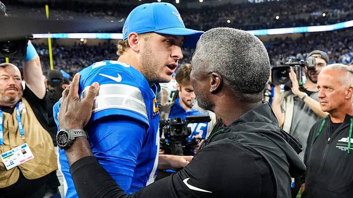 New York Jets head coach Aaron Glenn hugs Detroit Lions quarterback Jared Goff New York Jets head coach Aaron Glenn hugs Detroit Lions quarterback Jared Goff