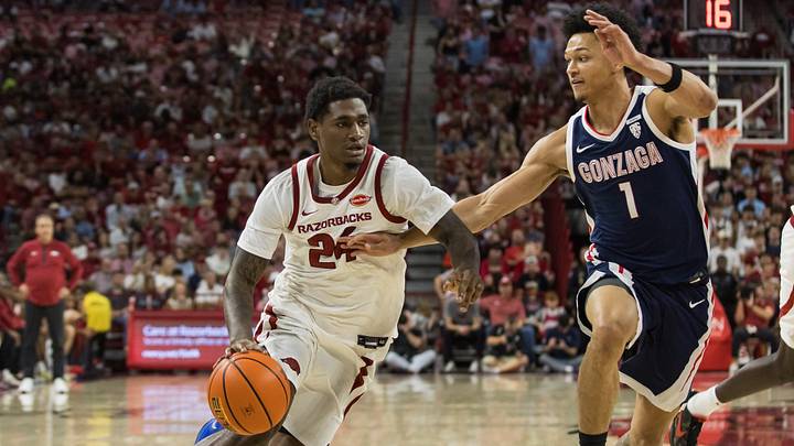 Arkansas Razorbacks guard Billy Richmond III (24) drives to the basket past Gonzaga Bulldogs guard Isiah Harwell (1) during the first half at Bud Walton Arena. Arkansas Razorbacks guard Billy Richmond III (24) drives to the basket past Gonzaga Bulldogs guard Isiah Harwell (1) during the first half at Bud Walton Arena.