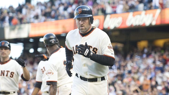 Jul 3, 2008; San Francisco, CA, USA; San Francisco Giants infielder Rich Aurilia (35) hits a three-run home run during the seventh inning against the Chicago Cubs at AT&T Park in San Francisco, CA. 