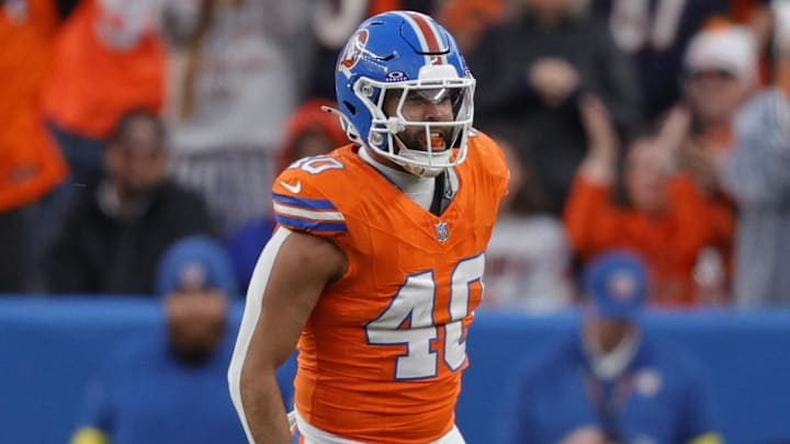 Jan 4, 2026; Denver, Colorado, USA; Denver Broncos linebacker Justin Strnad (40) celebrates after a sack during the second half against the Los Angeles Chargers at Empower Field at Mile High. Mandatory Credit: Isaiah J. Downing-Imagn Images Jan 4, 2026; Denver, Colorado, USA; Denver Broncos linebacker Justin Strnad (40) celebrates after a sack during the second half against the Los Angeles Chargers at Empower Field at Mile High. Mandatory Credit: Isaiah J. Downing-Imagn Images