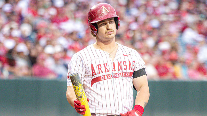 Arkansas first baseman Rocco Peppi holds the bat at the plate against Texas A&M