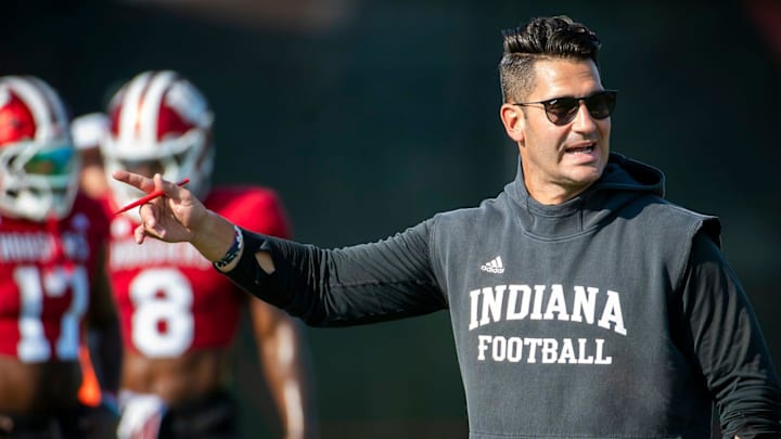 Indiana quarterbacks coach and co-offensive coordinator Tino Sunseri instructs the Hoosiers during fall camp.