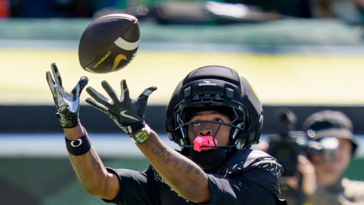 Combat Ducks wide receiver Dakorien Moore makes a catch for a touchdown during the Oregon Ducks annual spring game on April 25, 2026 at Autzen Stadium in Eugene, Oregon.