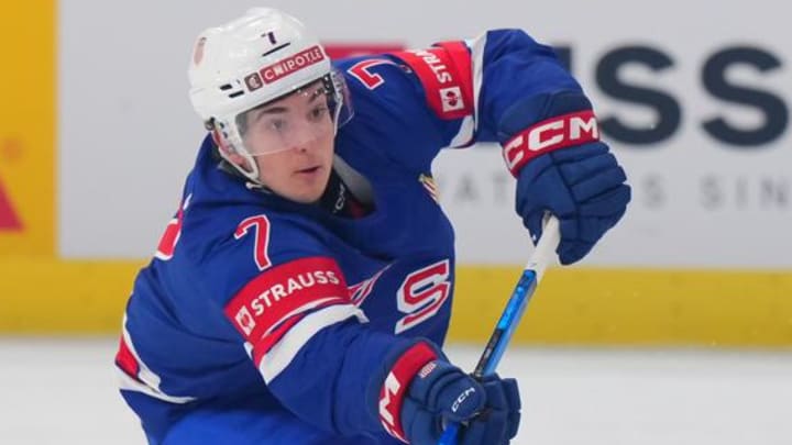 Former Massachusetts defenseman Ryan Ufko of the Nashville Predators makes a pass for Team USA at the 2026 IIHF World Championship in Switzerland. 