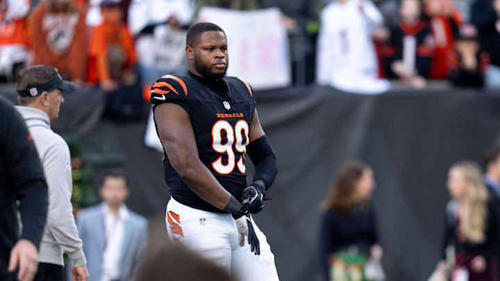 Cincinnati Bengals defensive end Myles Murphy (99) stretches with the team before the NFL game between the Cincinnati Bengals and the Denver Broncos at Paycor Stadium in Cincinnati on Saturday, Dec. 28, 2024.
