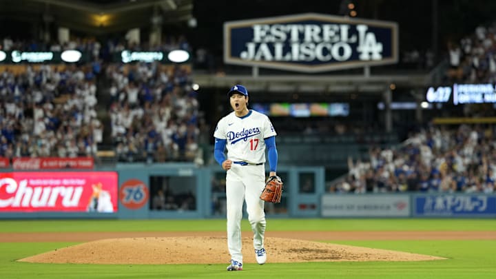 Oct 17, 2025; Los Angeles, California, USA; Los Angeles Dodgers two-way player Shohei Ohtani (17) reacts after pitching against the Milwaukee Brewers in the third inning during game four of the NLCS round for the 2025 MLB playoffs at Dodger Stadium. Oct 17, 2025; Los Angeles, California, USA; Los Angeles Dodgers two-way player Shohei Ohtani (17) reacts after pitching against the Milwaukee Brewers in the third inning during game four of the NLCS round for the 2025 MLB playoffs at Dodger Stadium.
