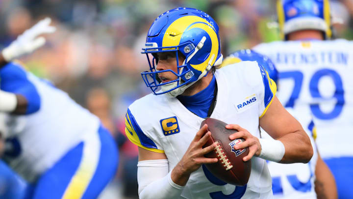 Nov 3, 2024; Seattle, Washington, USA; Los Angeles Rams quarterback Matthew Stafford (9) looks to pass the ball against the Seattle Seahawks during the first half at Lumen Field. Mandatory Credit: Steven Bisig-Imagn Images