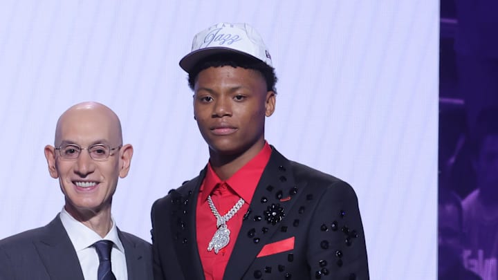 Jun 25, 2025; Brooklyn, NY, USA;  Ace Bailey stands with NBA commissioner Adam Silver after being selected as the fifth pick by the Utah Jazz in the first round of the 2025 NBA Draft at Barclays Center. Mandatory Credit: Brad Penner-Imagn Images