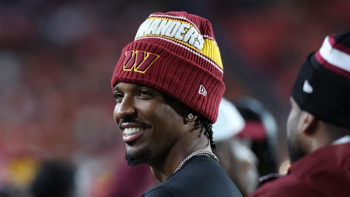 Aug 18, 2025; Landover, Maryland, USA; Washington Commanders quarterback Jayden Daniels (5) looks on from the sidelines during the second half against the Cincinnati Bengals at Northwest Stadium. Mandatory Credit: Amber Searls-Imagn Images Aug 18, 2025; Landover, Maryland, USA; Washington Commanders quarterback Jayden Daniels (5) looks on from the sidelines during the second half against the Cincinnati Bengals at Northwest Stadium. Mandatory Credit: Amber Searls-Imagn Images