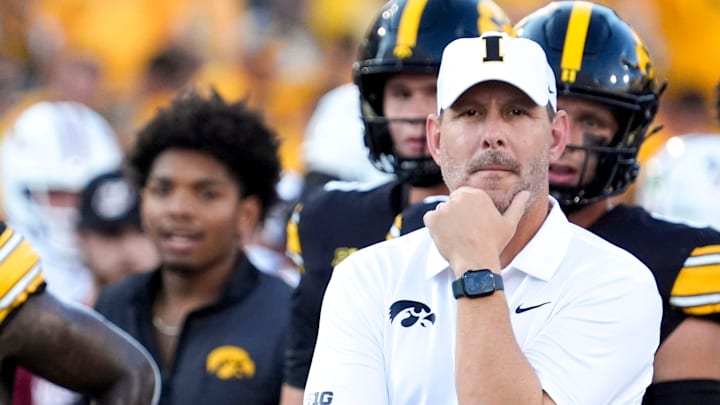 Iowa Offensive Coordinator Tim Lester watches warmups before the Hawkeyes’ football game against the Massachusetts Minutemen Sept. 13, 2025 at Kinnick Stadium in Iowa City, Iowa.