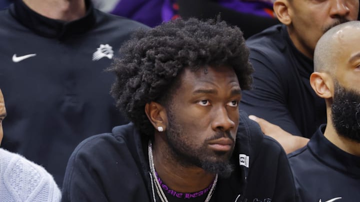 Mar 17, 2026; Minneapolis, Minnesota, USA; Phoenix Suns guard Jalen Green (4) and center Mark Williams (15) watch as their team plays the Minnesota Timberwolves in the fourth quarter at Target Center. Mandatory Credit: Bruce Kluckhohn-Imagn Images