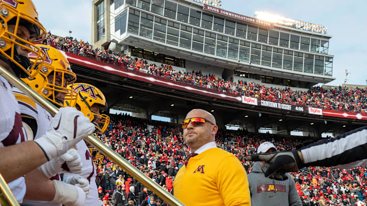 Minnesota head coach P.J. Fleck is shown with his team before their game at Camp Randall Stadium Friday, November 29, 2024 in Madison, Wisconsin. Minnesota head coach P.J. Fleck is shown with his team before their game at Camp Randall Stadium Friday, November 29, 2024 in Madison, Wisconsin.