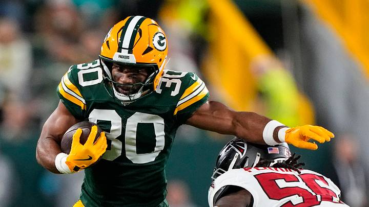 Green Bay Packers running back Chris Brooks (30) rushes with the football against the Atlanta Falcons. Green Bay Packers running back Chris Brooks (30) rushes with the football against the Atlanta Falcons.
