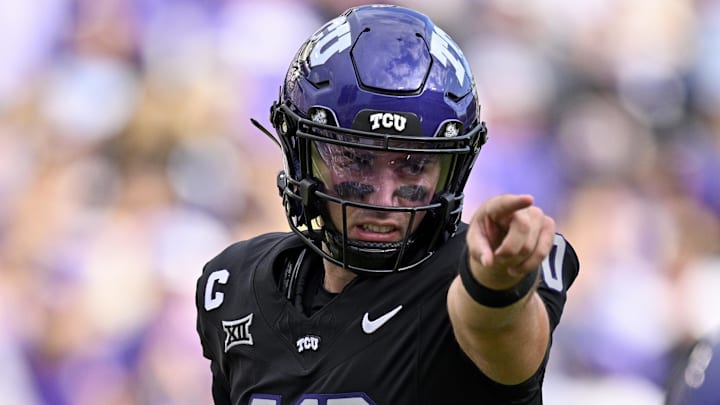 Nov 29, 2025; Fort Worth, Texas, USA; TCU Horned Frogs quarterback Josh Hoover (10) sets the play during the game between the Horned Frogs and the Bearcats at Amon G. Carter Stadium. Mandatory Credit: Jerome Miron-Imagn Images