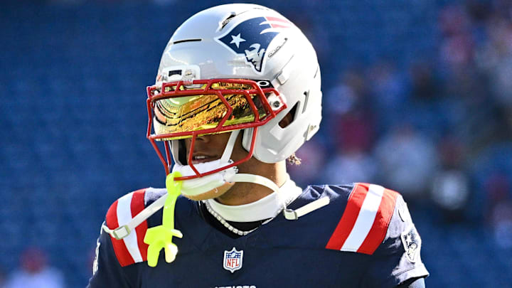 Nov 2, 2025; Foxborough, Massachusetts, USA; New England Patriots cornerback Christian Gonzalez (0) warms up before a game against the Atlanta Falcons at Gillette Stadium. Mandatory Credit: Eric Canha-Imagn Images