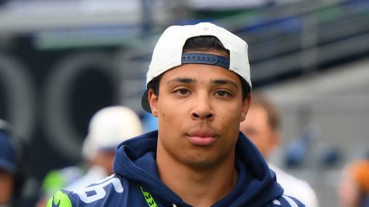 Seattle Seahawks running back Zach Charbonnet walks onto the field