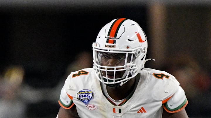Dec 31, 2025; Arlington, TX, USA; Miami Hurricanes defensive lineman Rueben Bain Jr. (4) rushes the line during the 2025 Cotton Bowl and quarterfinal game of the College Football Playoff at AT&T Stadium. Mandatory Credit: Jerome Miron-Imagn Images