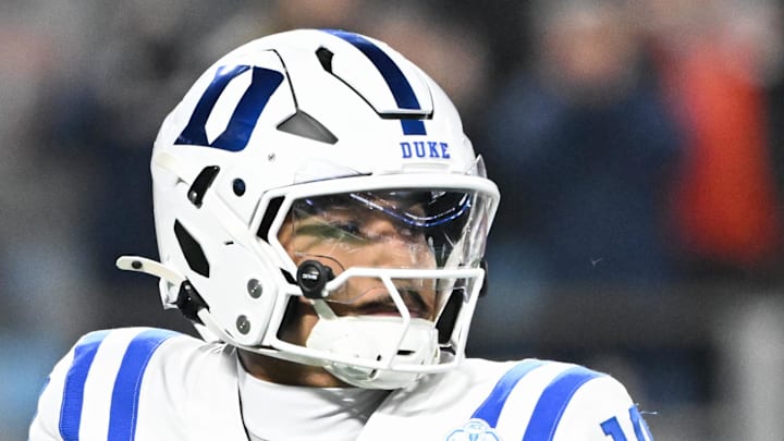 Dec 6, 2025; Charlotte, NC, USA; Duke Blue Devils quarterback Darian Mensah (10) looks to throw in the second quarter against the Virginia Cavaliers during the 2025 ACC Championship game at Bank of America Stadium. Mandatory Credit: Bob Donnan-Imagn Images Dec 6, 2025; Charlotte, NC, USA; Duke Blue Devils quarterback Darian Mensah (10) looks to throw in the second quarter against the Virginia Cavaliers during the 2025 ACC Championship game at Bank of America Stadium. Mandatory Credit: Bob Donnan-Imagn Images