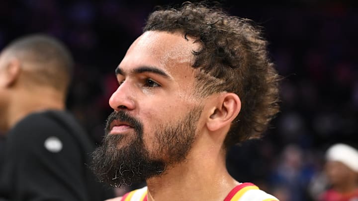 Trae Young #11 looks on against the Philadelphia 76ers.