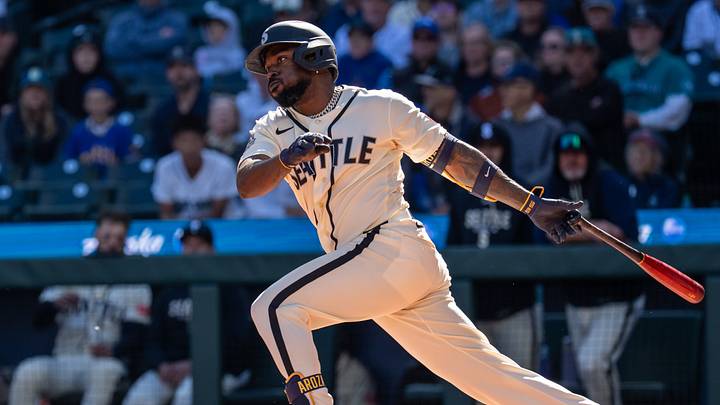 Seattle, Washington, USA;  left fielder Randy Arozarena (56) takes a swing during an at-bat against the Los Angeles Angels at T-Mobile Park. Mandatory Credit: Stephen Brashear-Imagn Images