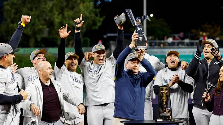 Oct 19, 2024; Cleveland, Ohio, USA; New York Yankees owner Hal Steinbrenner raises the American League Championship trophy after the New York Yankees beat the Cleveland Guardians during game five of the ALCS for the 2024 MLB playoffs at Progressive Field. Mandatory Credit: Scott Galvin-Imagn Images Oct 19, 2024; Cleveland, Ohio, USA; New York Yankees owner Hal Steinbrenner raises the American League Championship trophy after the New York Yankees beat the Cleveland Guardians during game five of the ALCS for the 2024 MLB playoffs at Progressive Field. Mandatory Credit: Scott Galvin-Imagn Images