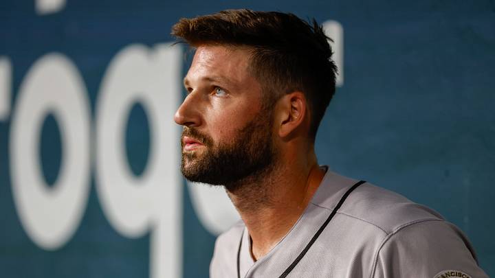 Arlington, Texas, USA; San Francisco Giants pitcher Sam Hentges (31) looks on from the dugout during the eighth inning against the Texas Rangers at Globe Life Field. Mandatory Credit: Andrew Dieb-Imagn Images